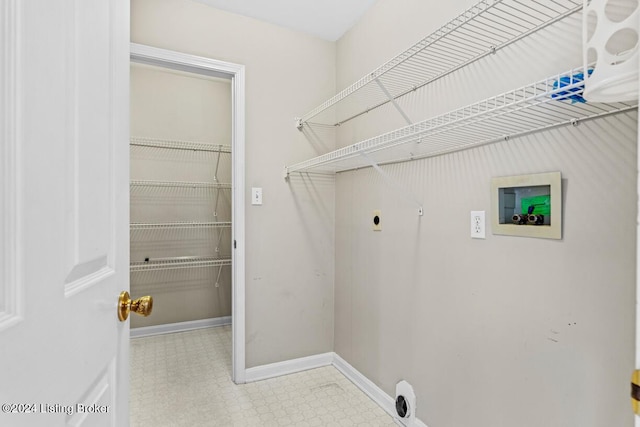 laundry area with hookup for an electric dryer and washer hookup