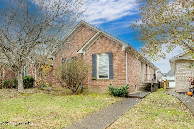 view of home's exterior featuring a lawn