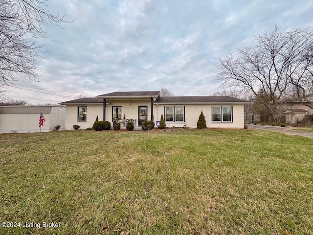 view of front of home with a front lawn