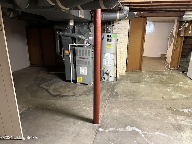 basement with gas water heater and heating unit