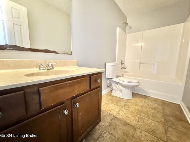 full bathroom featuring vanity, a textured ceiling, shower / bath combination, and toilet