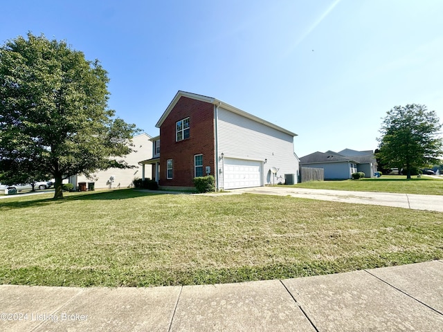 view of home's exterior with central air condition unit, a garage, and a lawn