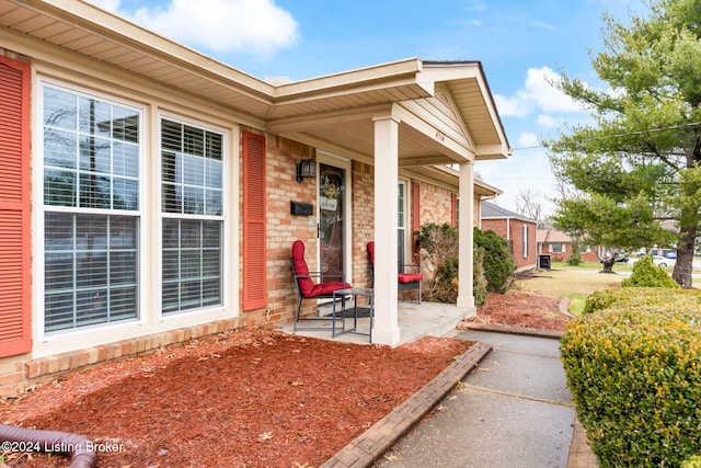 view of patio featuring a porch