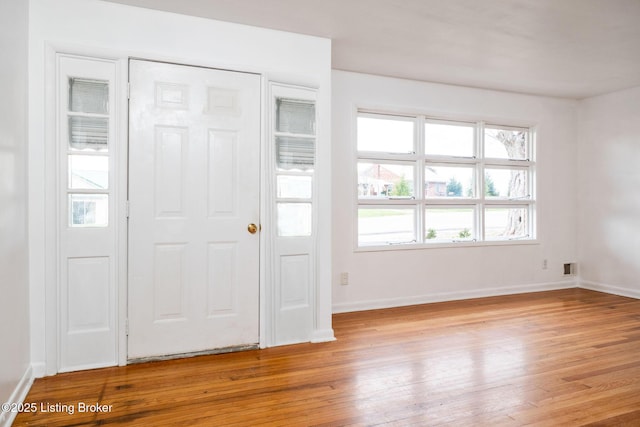 entrance foyer with light hardwood / wood-style floors