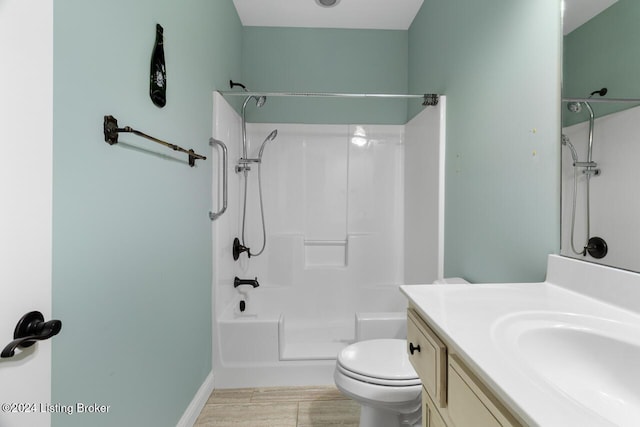 full bathroom with vanity, toilet, and shower / washtub combination