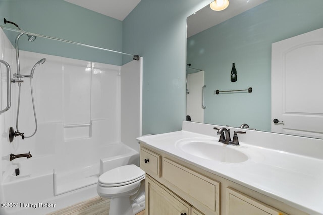 full bathroom with vanity, toilet, and shower / washtub combination