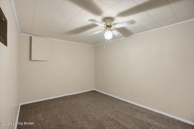 unfurnished room featuring ceiling fan, carpet, and ornamental molding