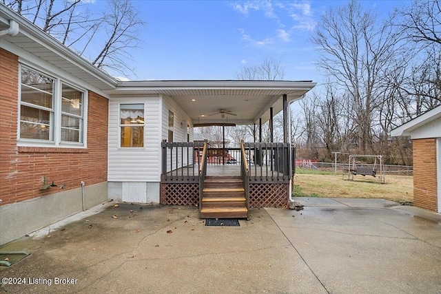 view of patio / terrace with ceiling fan and a wooden deck