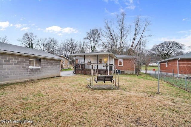 view of yard with covered porch