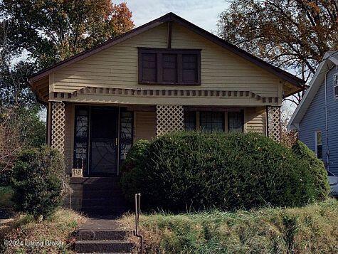 bungalow-style home with a porch