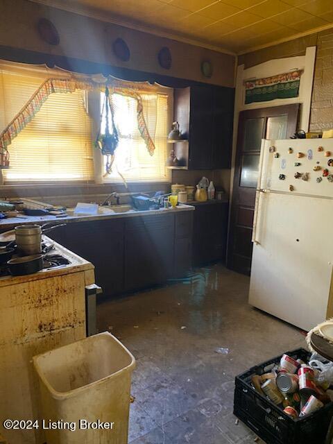 kitchen featuring white fridge