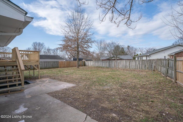 view of yard featuring a deck