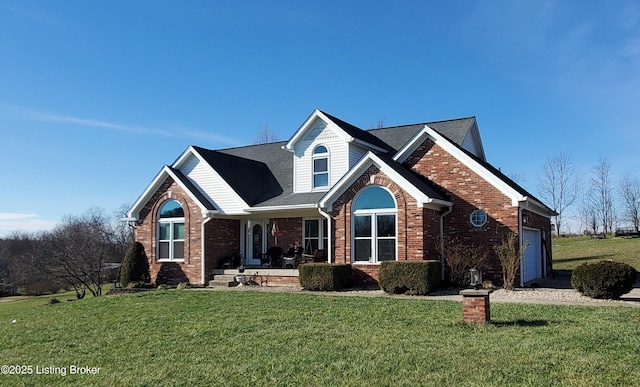 front facade featuring a garage and a front yard