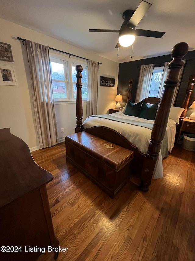 bedroom featuring ceiling fan and hardwood / wood-style flooring