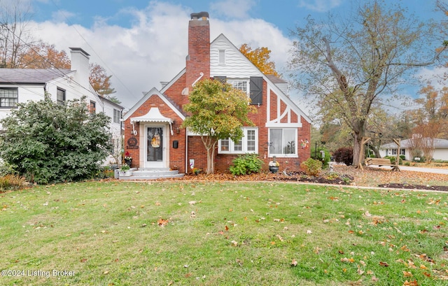 view of front of home with a front lawn