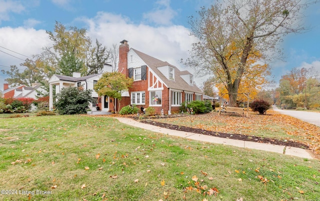 view of home's exterior featuring a lawn