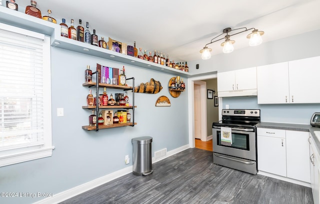 kitchen with white cabinetry, stainless steel range with electric cooktop, and dark wood-type flooring