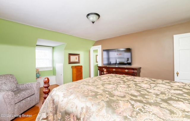 bedroom with wood-type flooring