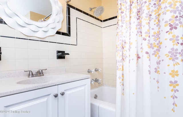 bathroom with vanity and shower / bath combo with shower curtain