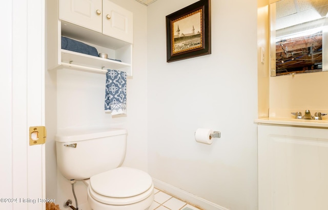 bathroom featuring tile patterned flooring and toilet