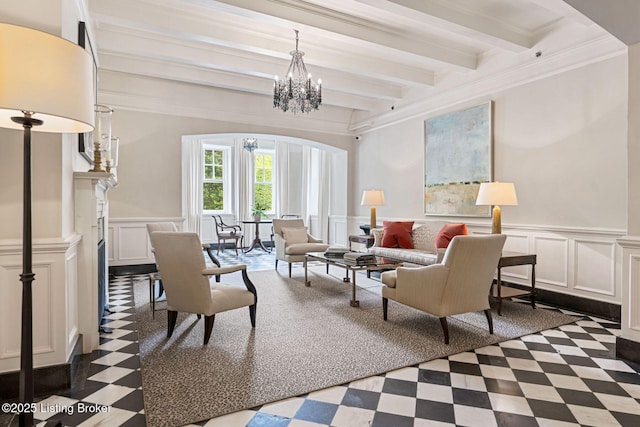 living room with crown molding, beamed ceiling, and an inviting chandelier