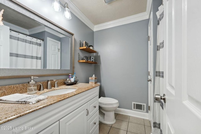 bathroom with tile patterned flooring, vanity, toilet, and crown molding