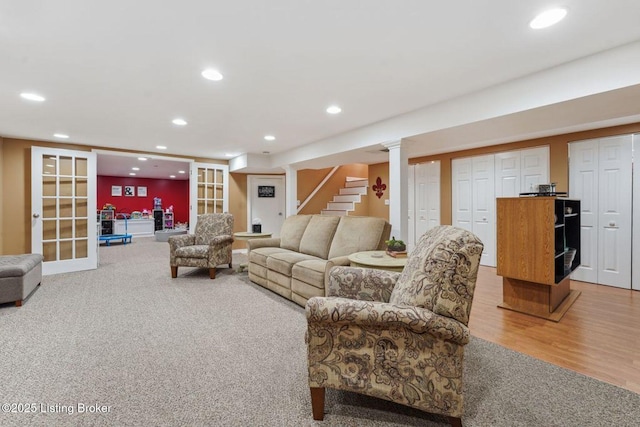 living room featuring carpet flooring and french doors