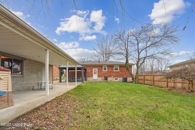 view of yard featuring a gazebo, central AC unit, and a patio area