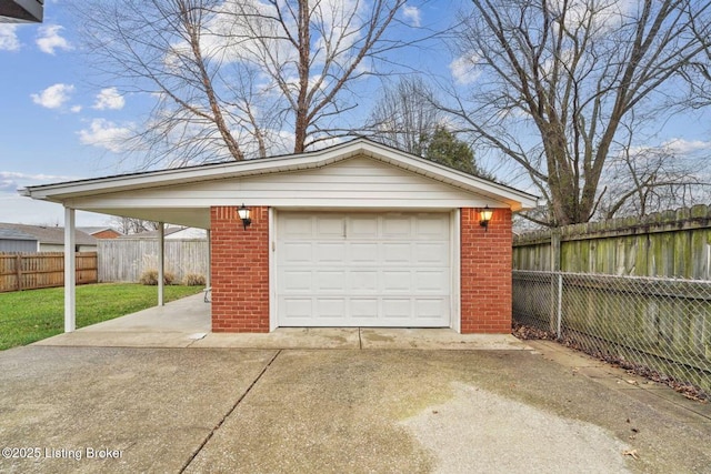 garage featuring a yard