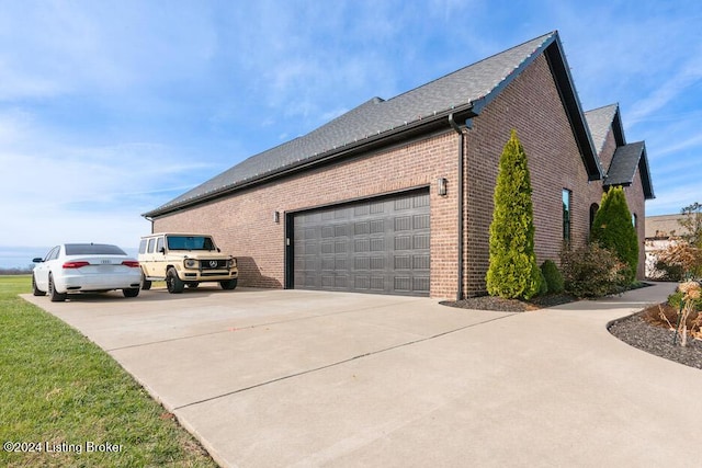 view of property exterior featuring a garage