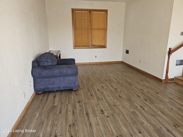 sitting room featuring dark hardwood / wood-style flooring