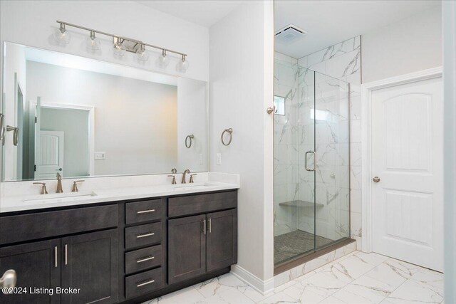 bathroom featuring vanity and walk in shower