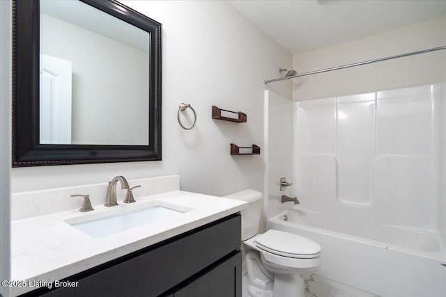 full bathroom with vanity, shower / bath combination, and toilet