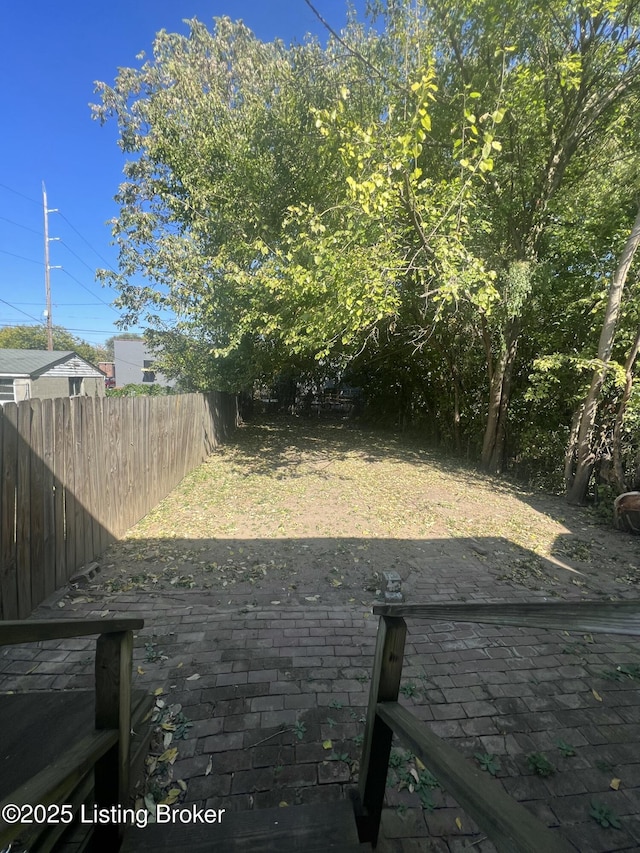 view of yard featuring fence