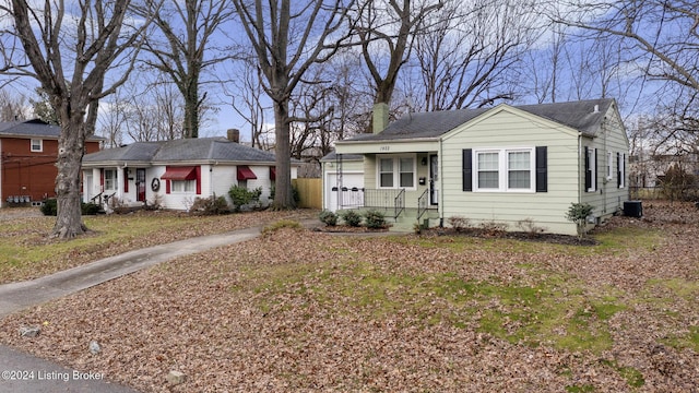 view of front of home featuring a porch and central AC