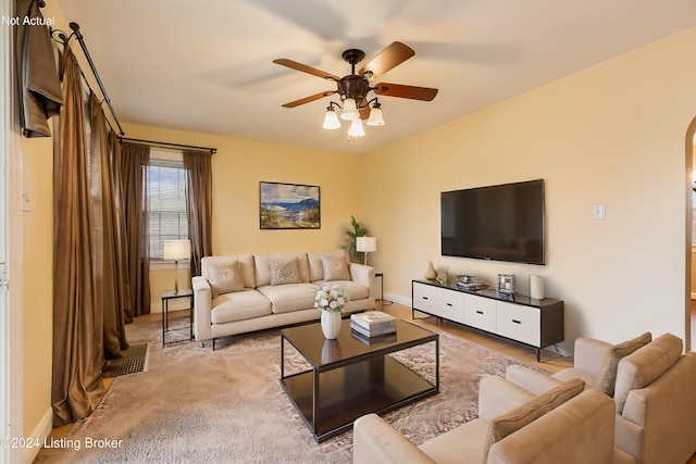 living room with ceiling fan