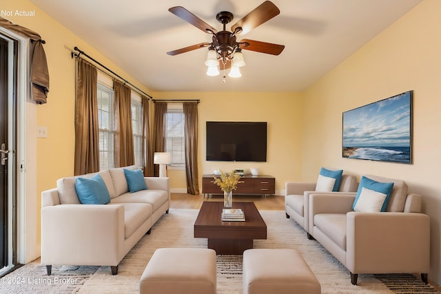 living room with ceiling fan