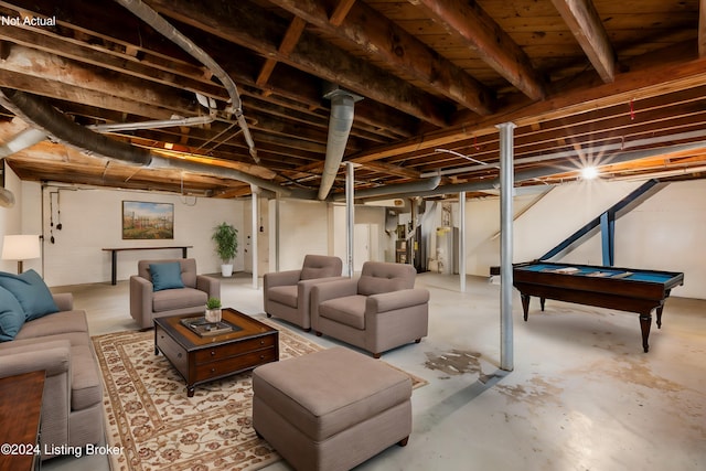 basement with water heater and pool table