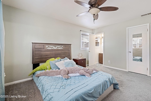 bedroom featuring multiple windows, ceiling fan, and carpet