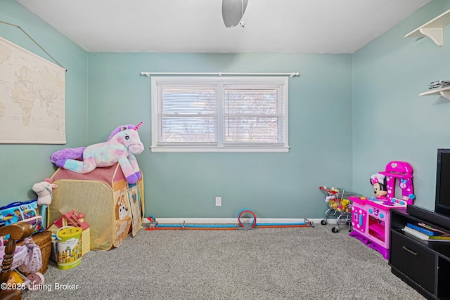 playroom featuring carpet flooring and ceiling fan