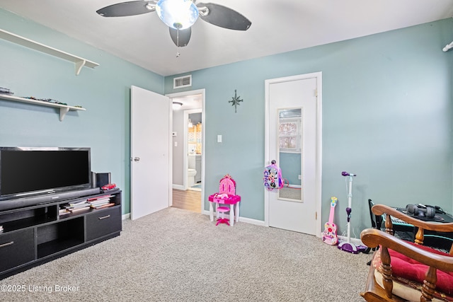 recreation room featuring carpet flooring and ceiling fan