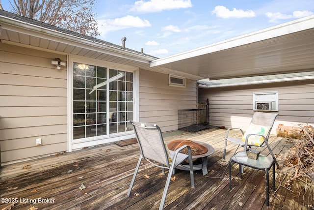 deck with an outdoor fire pit