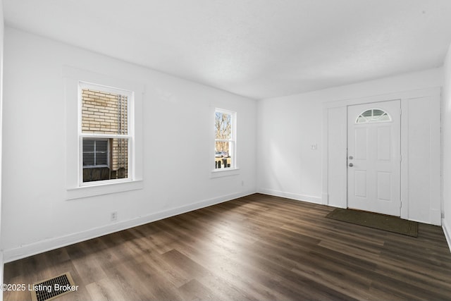 foyer featuring dark hardwood / wood-style floors