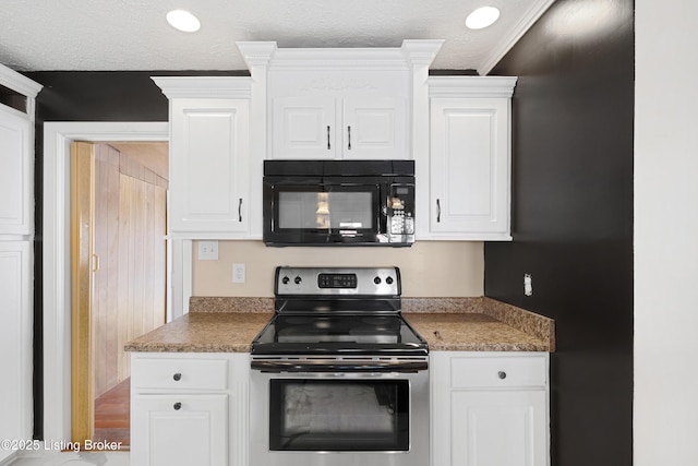 kitchen featuring electric range, white cabinets, ornamental molding, and a textured ceiling