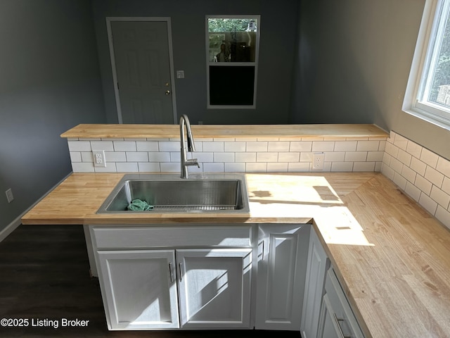 1727 Lytle St, Louisville, KY 40203 - kitchen with wood counters, wood finished floors, and backsplash