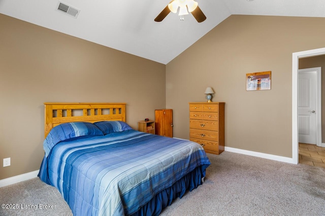 carpeted bedroom with ceiling fan and lofted ceiling