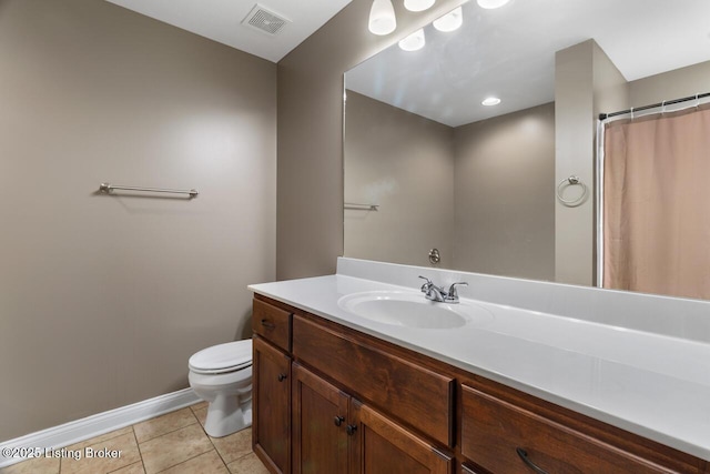 bathroom with walk in shower, tile patterned flooring, vanity, and toilet