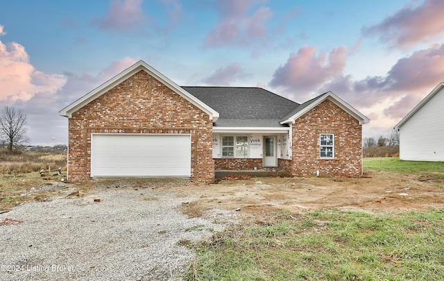 view of front of home featuring a garage