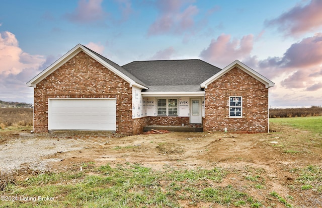 view of front of house with a garage