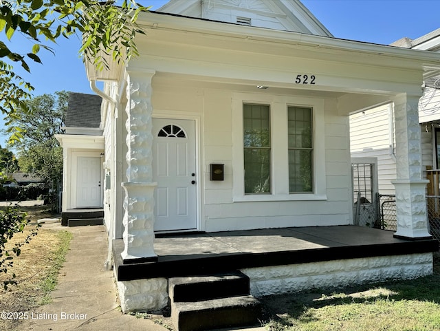 doorway to property with covered porch